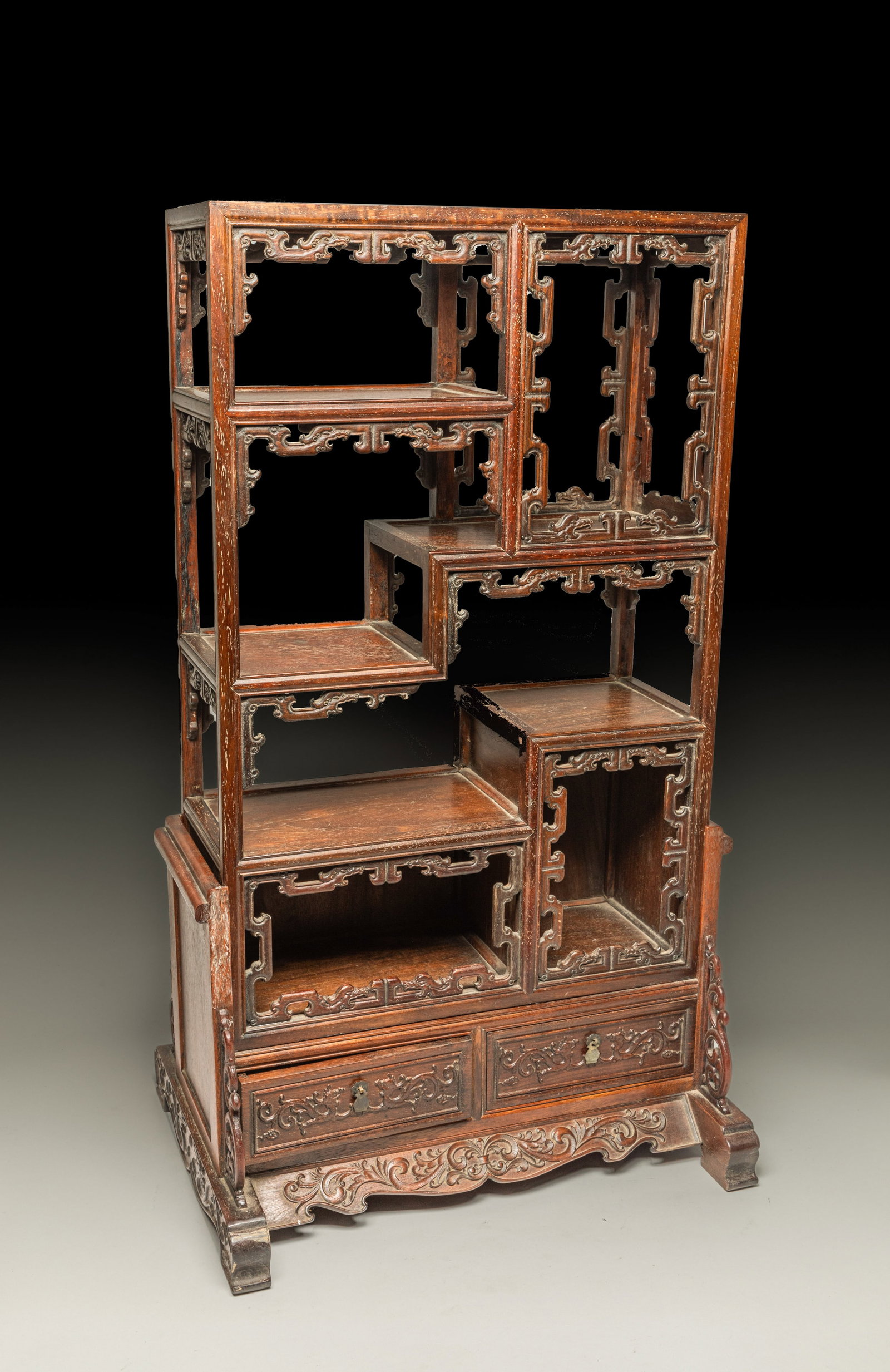 Chinese Wood Table Cabinet: Collectible Chinese wood table cabinet, carved along the edges with archaistic dragons, the foot with foliage motif. Approx. 34.5*18*14 inch.