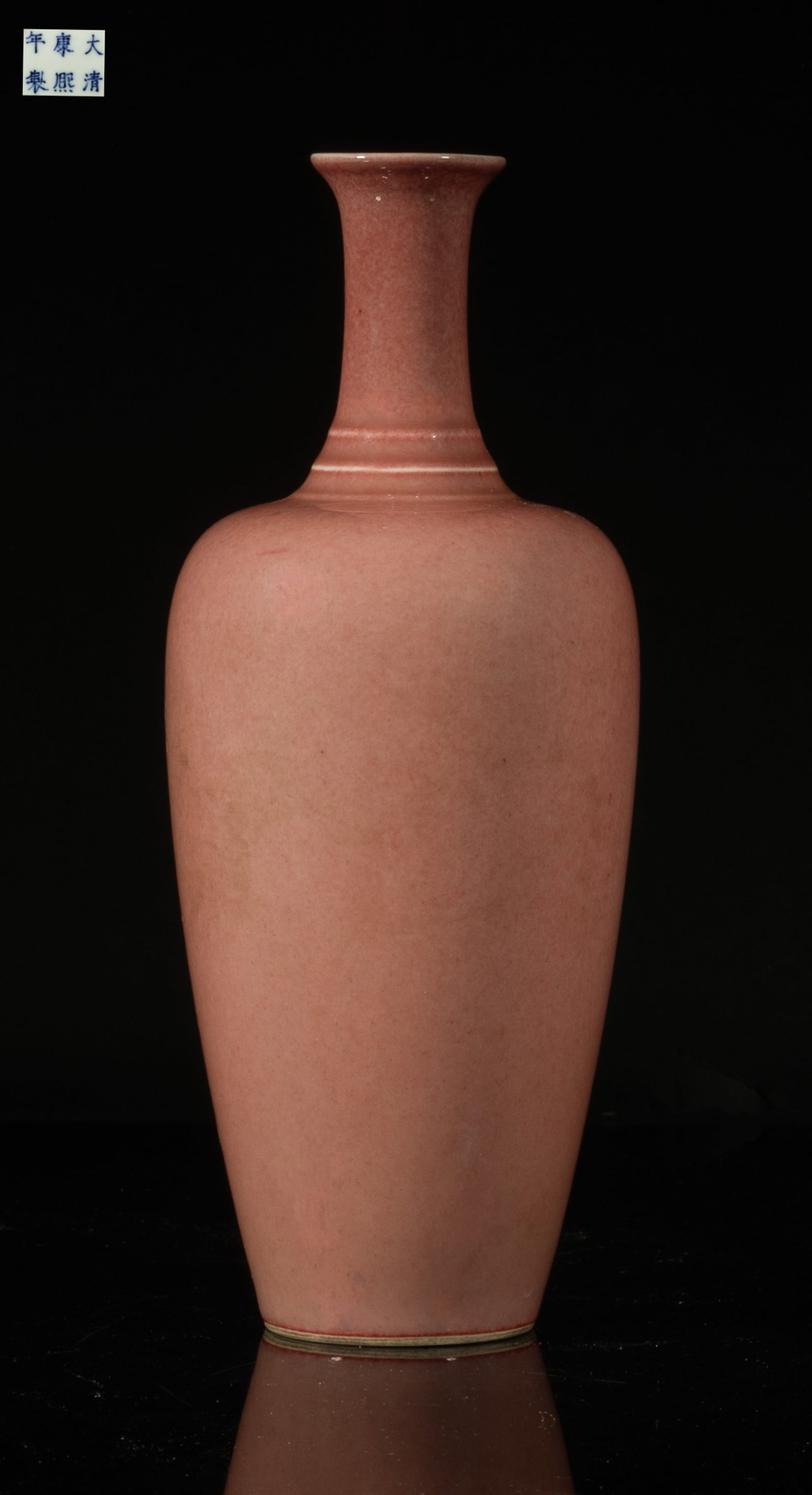 Chinese Export Red Glazed Porcelain Cabinet Vase: Of baluster form rising to a cylindrical neck and a flared rim, covered with mottled red glaze, the bottom marked with six characters. Approx. 8.8*3.5 inch.