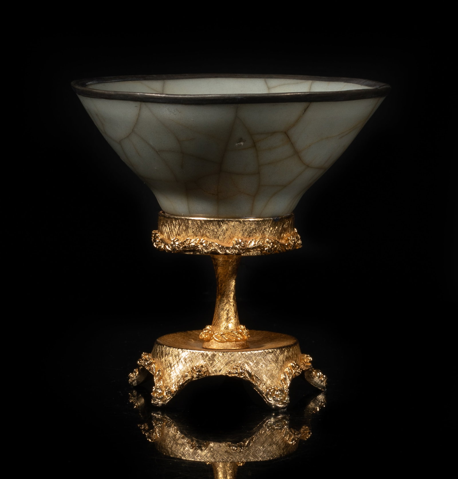 Chinese Export Guan Ware Porcelain Bowl: The porcelain bowl of conical form, covered in mottled gray glaze with a matrix of brown crackles, set on a tall metal stand. Approx. 4.9*4.8 inch (w/ stand).