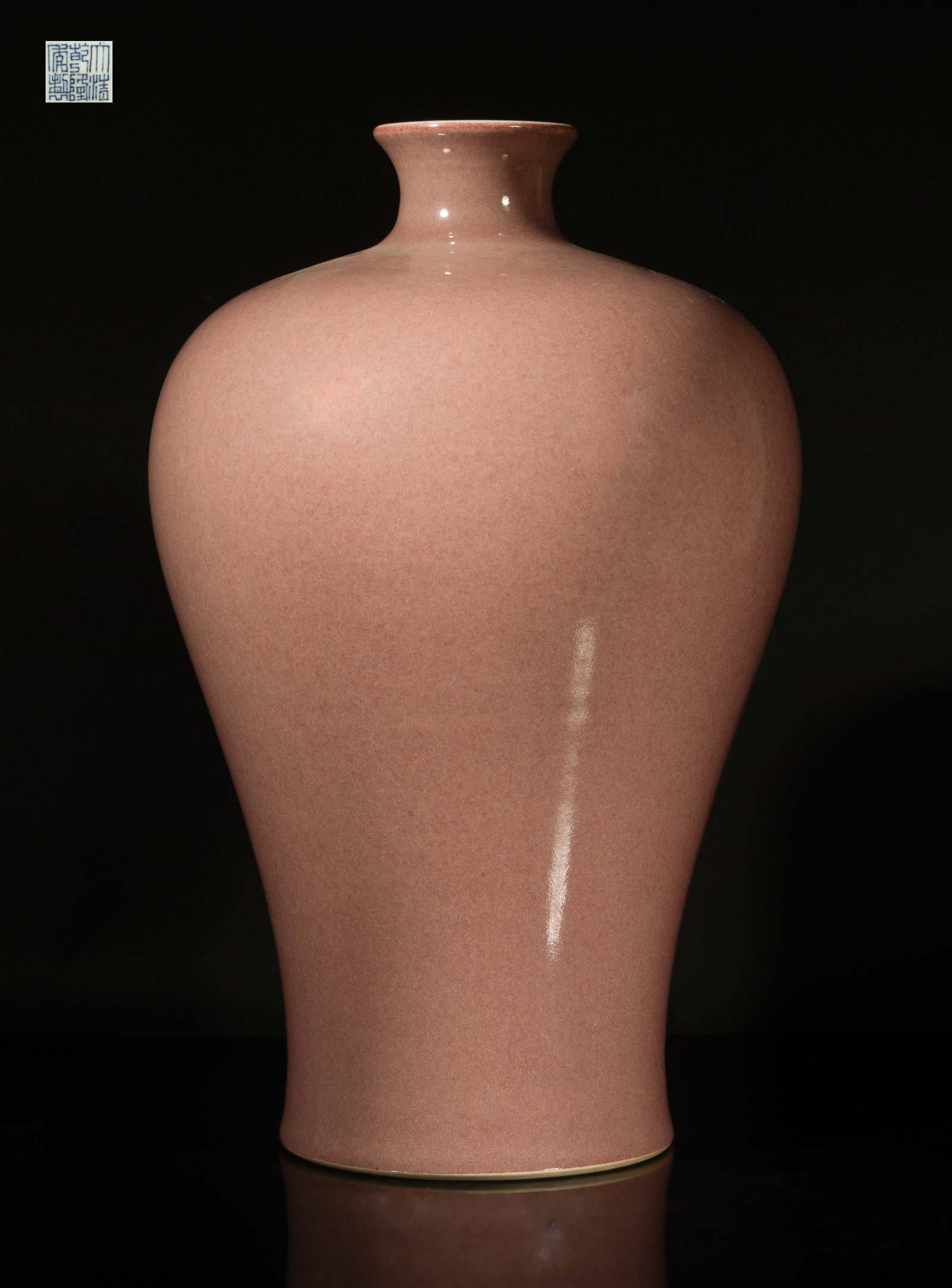 Tall Chinese Export Porcelain Vase: Of tall baluster form with a short waisted neck, the exterior covered with soft red glaze, the bottom with a six-character mark. Approx. 13.5*8.5 inch. The Estate of the Hung & Maza, Huntington
