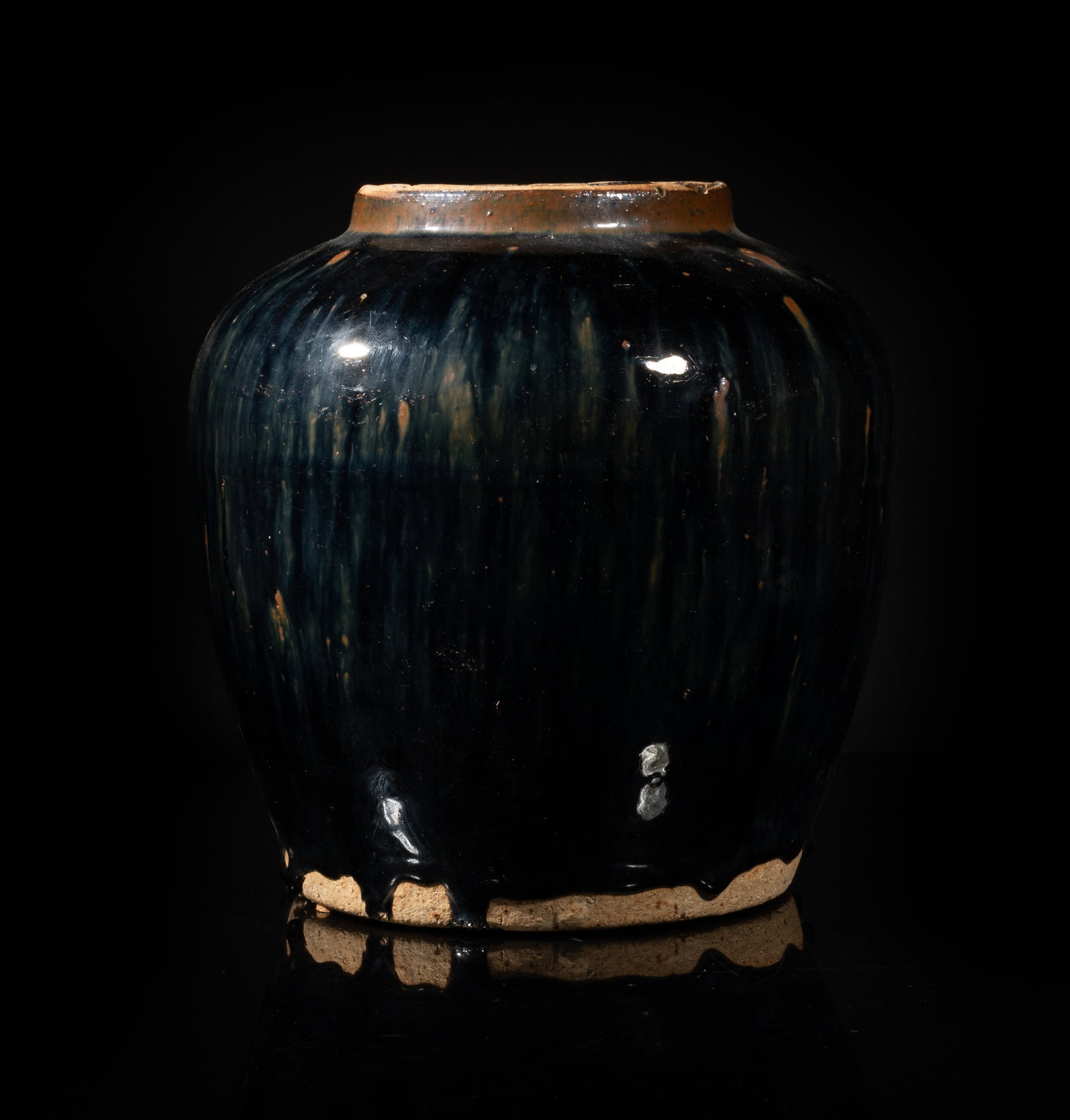 Late Ming Chinese Jichou Porcelain Jar: The jar inside and out covered in lustrous black glaze with brown splashes, the thick glaze stopping above the unglazed foot. Approx. 8.2*8.2 inch.