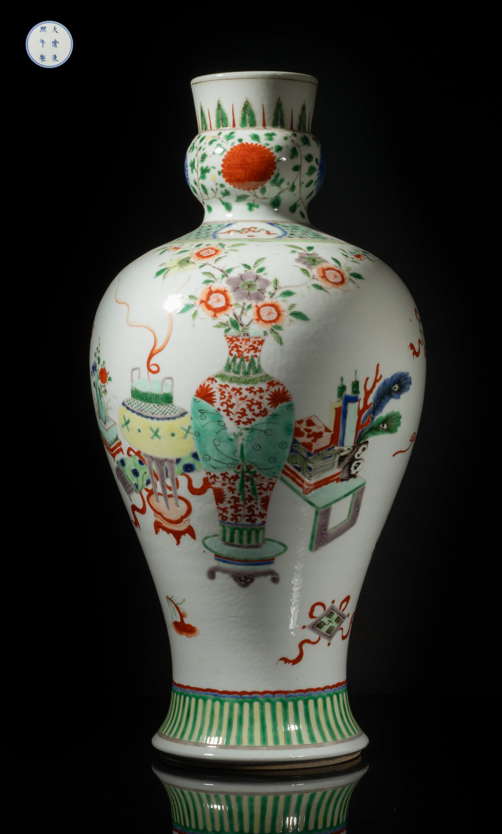 Tall Chinese Export Wuchai Porcelain Vase: The baluster body rising from a splayed foot to a bulbous neck and a gently flared rim, the body painted with scholar bogu patterns, the neck with leafy floral sprays under a band of leaves, the