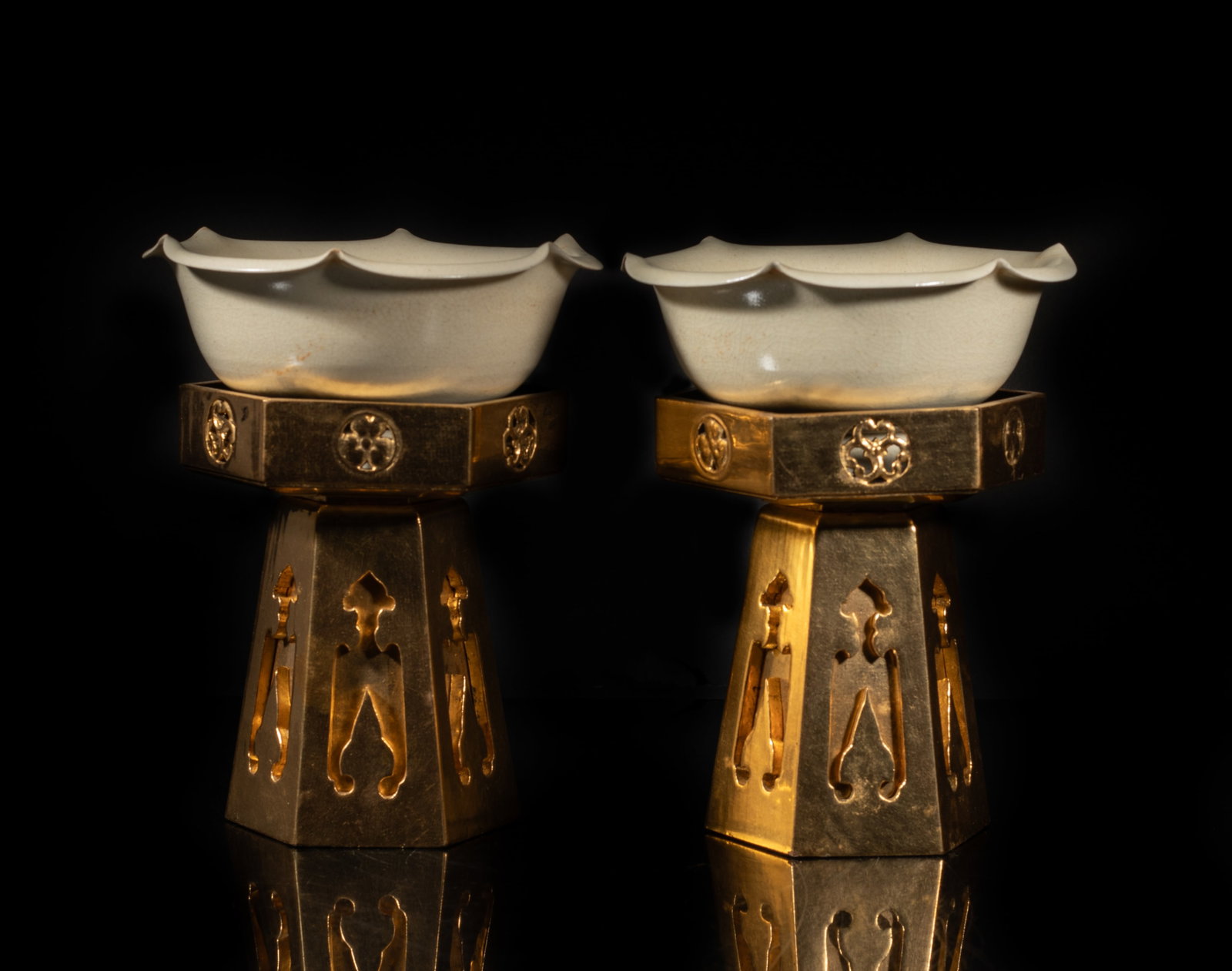 Two Chinese Porcelain Bowls w/ Lacquer Base: Two Chinese porcelain bowls covered with crackled creamy glaze, the bowl rim molded of floral form, each with a tall lacquer base. Approx. 5.3*2.4 inch (larger bowl size).