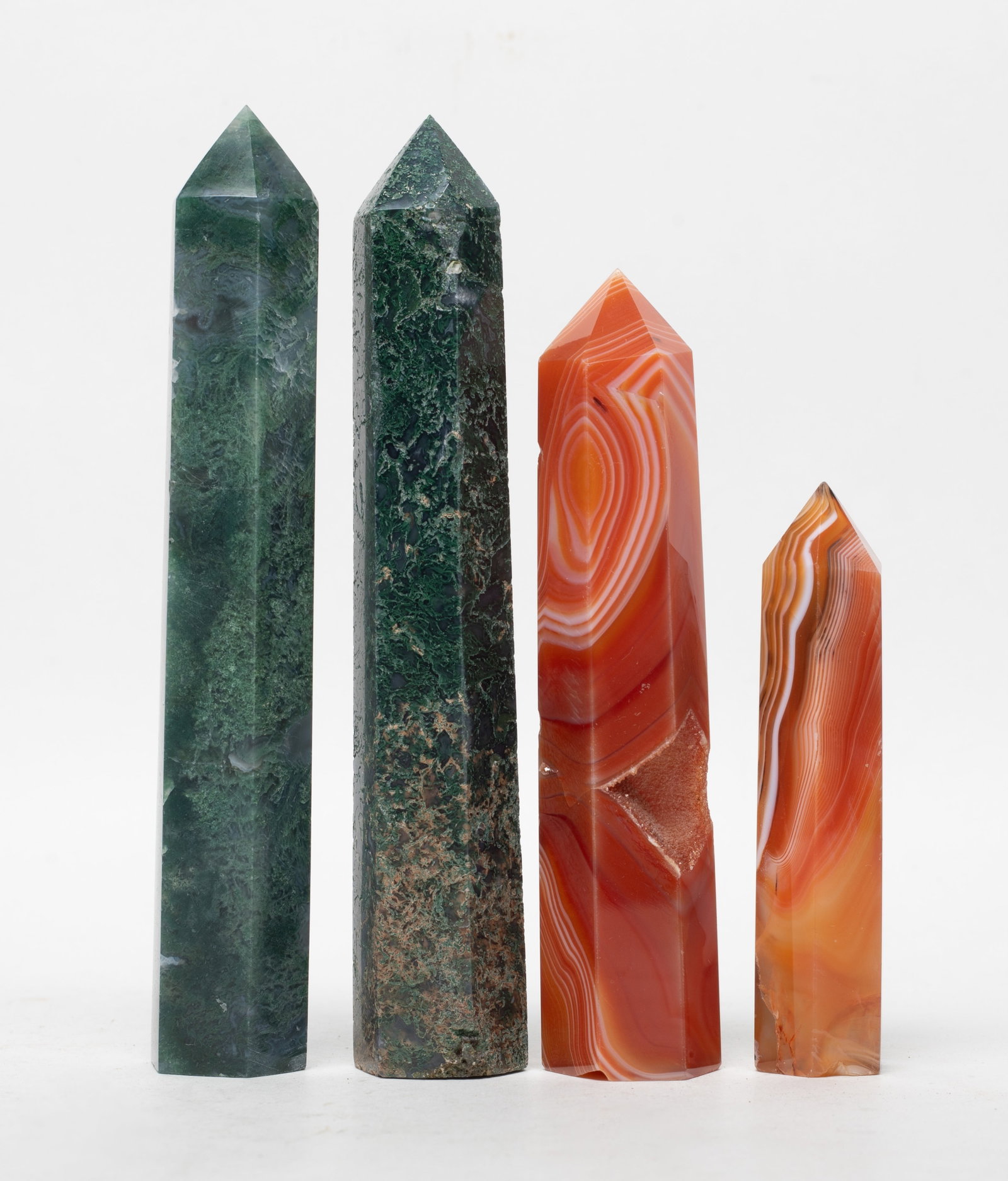 Carnelian & Moss Agate Sculptures of Obelisk: Set of four obelisk sculptures carved of carnelian and moss agate. Approx. 5.9*1 inch (largest).