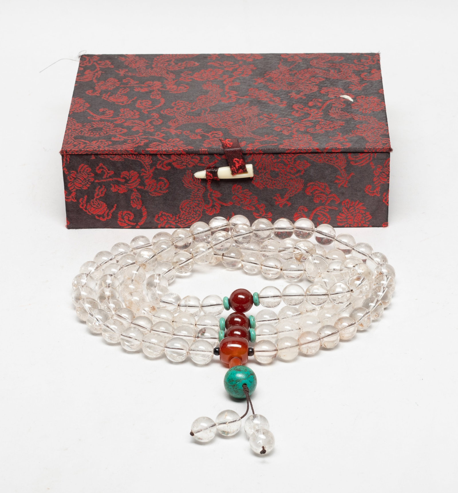Chinese Rock Crystal Prayer Beads: A long string of Chinese clear rock crystal carved prayer beads, with box. Approx. 58 inch L.