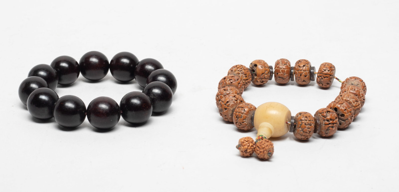 Chinese Wood & Seed Prayer Beads: Two strings of Chinese wood and seed carved prayer beads. Size varies.