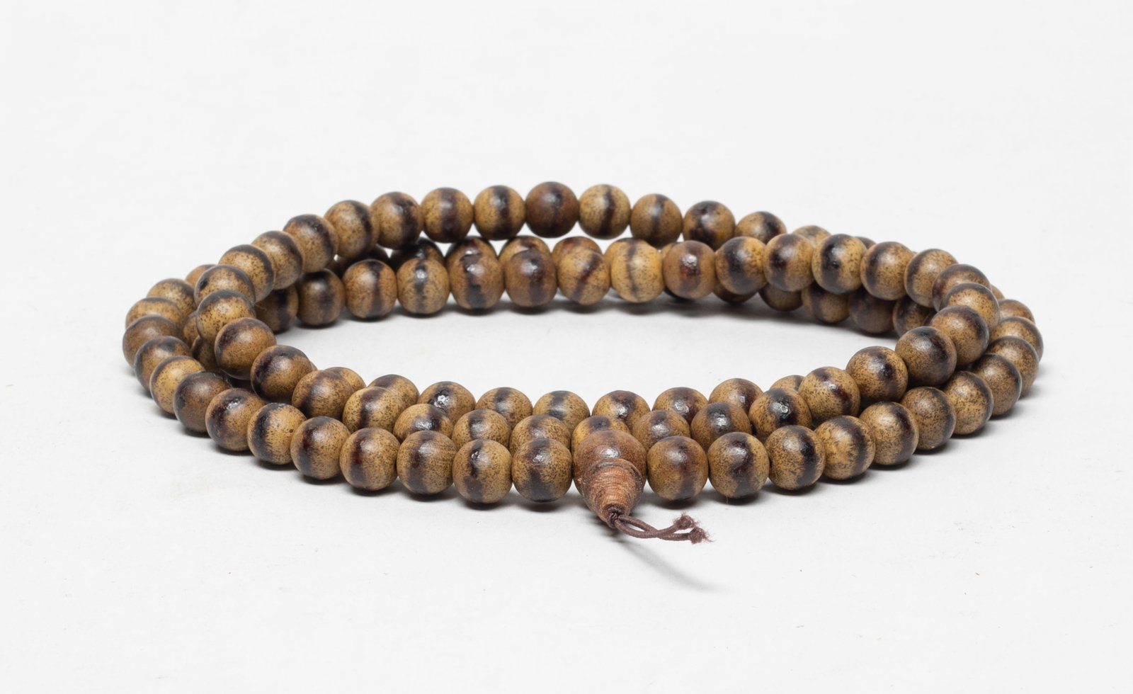 Estate Chinese Export Wood Prayer Beads: A long string of Chinese wood carved prayer beads, slightly fragrant. Approx. 45 gram (total bead weight), 0.4 inch D (bead size).