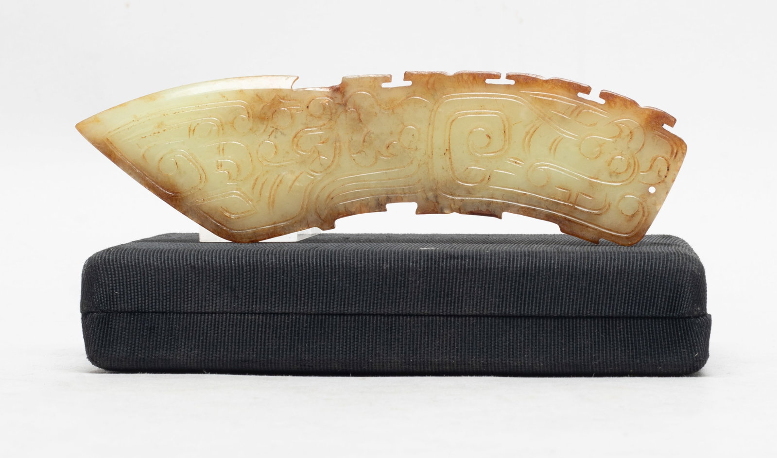 Estate Chinese Russet Jade Long Pendant: The flat pendant carved in low relief with stylized beast on both sides, with box. Approx. 6.1*1.6 inch (w/o box).