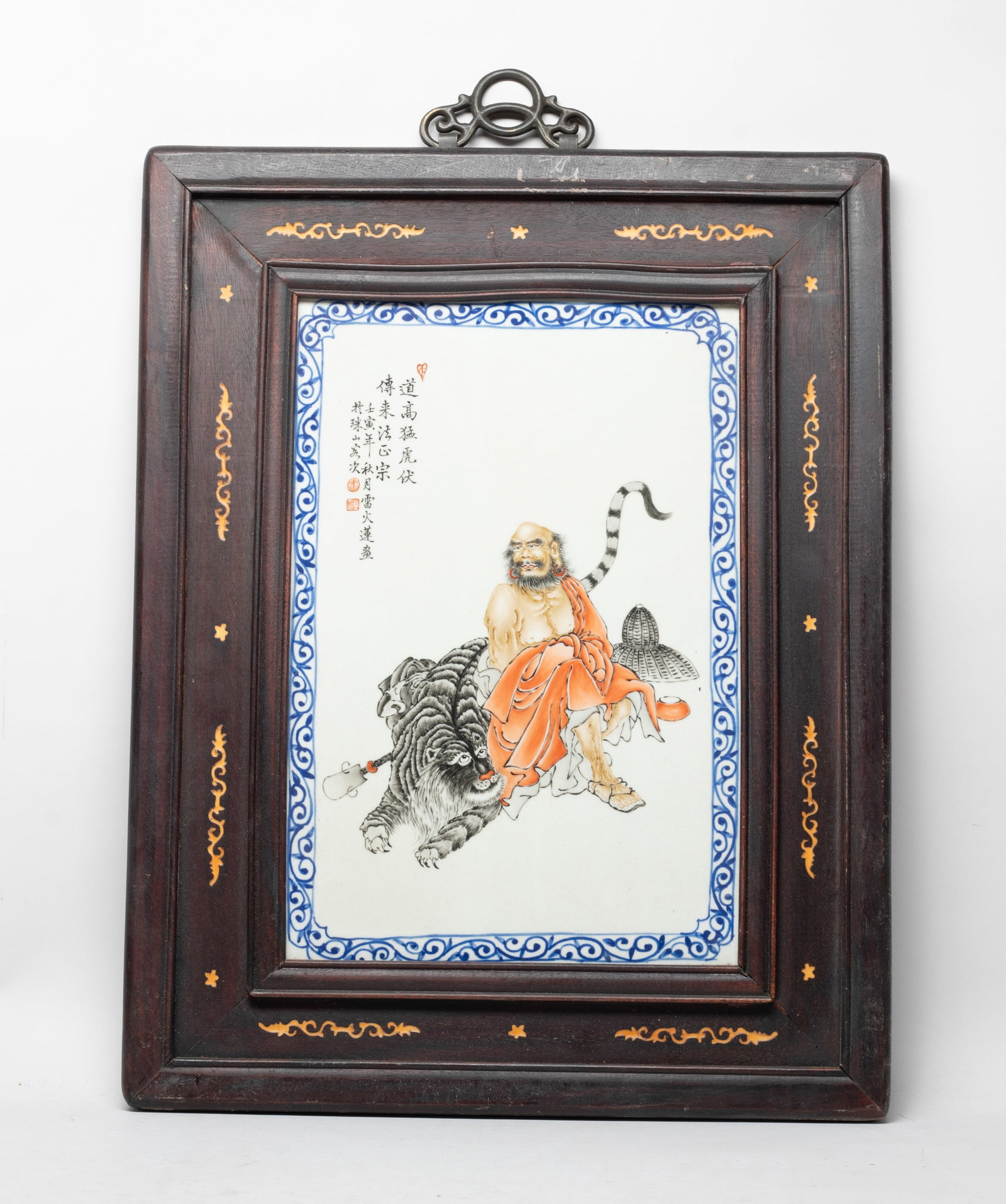 Chinese Wood Hanging Plaque Inlaid Porcelain: Chinese wall hanging wood plaque inlaid with a porcelain panel painted with Buddha seated on tiger, inscribed with related passages. Approx. 20.2*15.7 inch (wood plaque size).