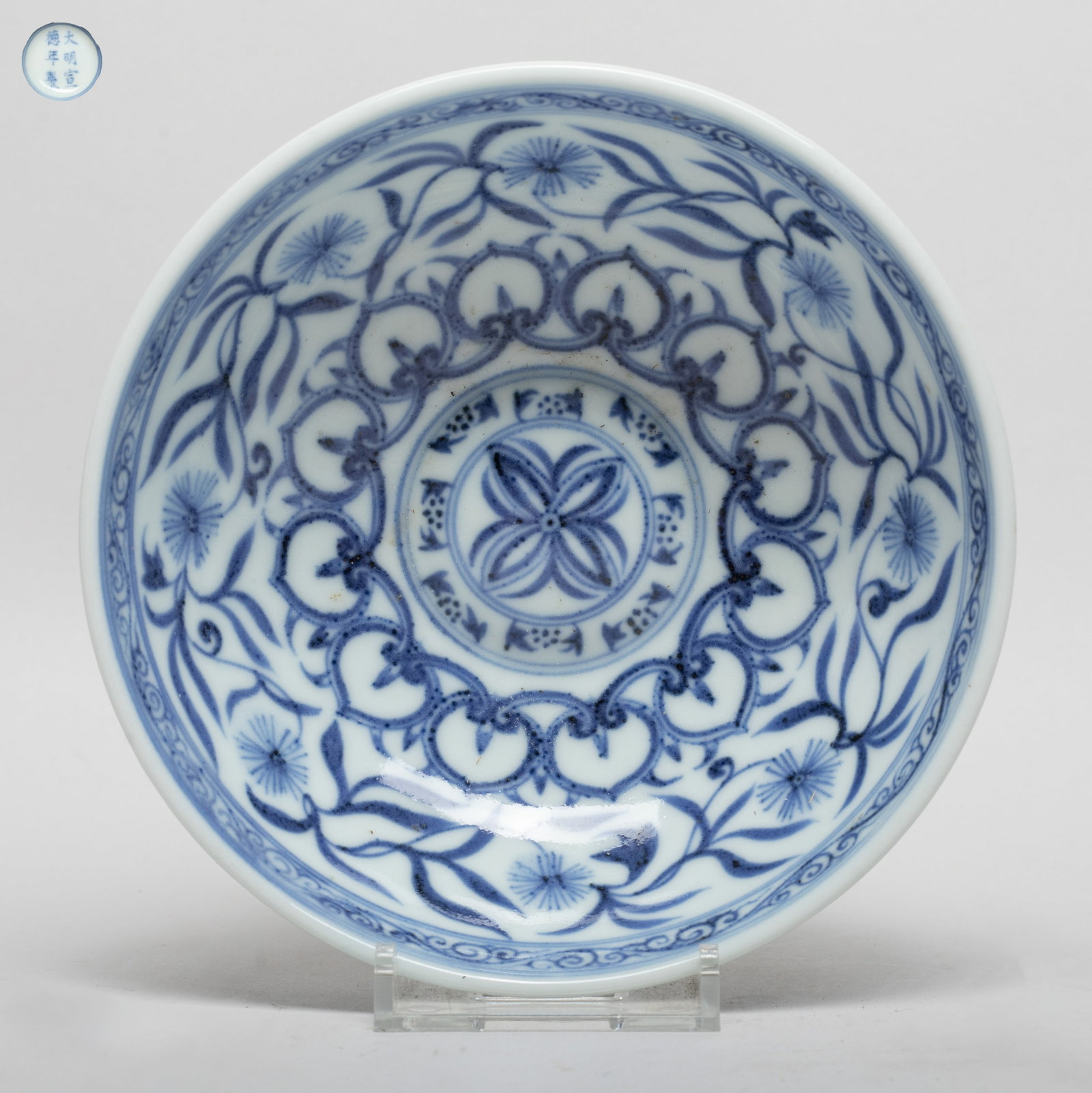Estate Chinese Blue & White Porcelain Bowl: The bowl interior painted with undulating stylized foliage, the exterior with bands of flower sprays and petals, the bottom marked with six characters enclosed in double circles. Approx. 5.4*1.8 inch.