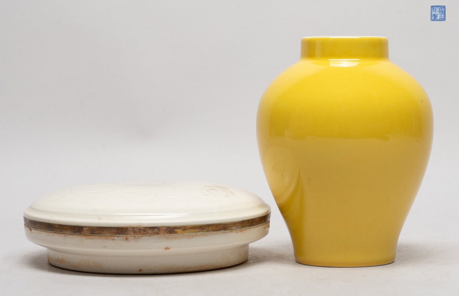 Estate Chinese Porcelain Ink Box & Vase: The vase exterior applied with bright yellow glaze, the bottom with a seal mark, the creamy glazed covered box top incised with flower, the bottom with three characters. Approx. 5.2*4 inch (vase size)