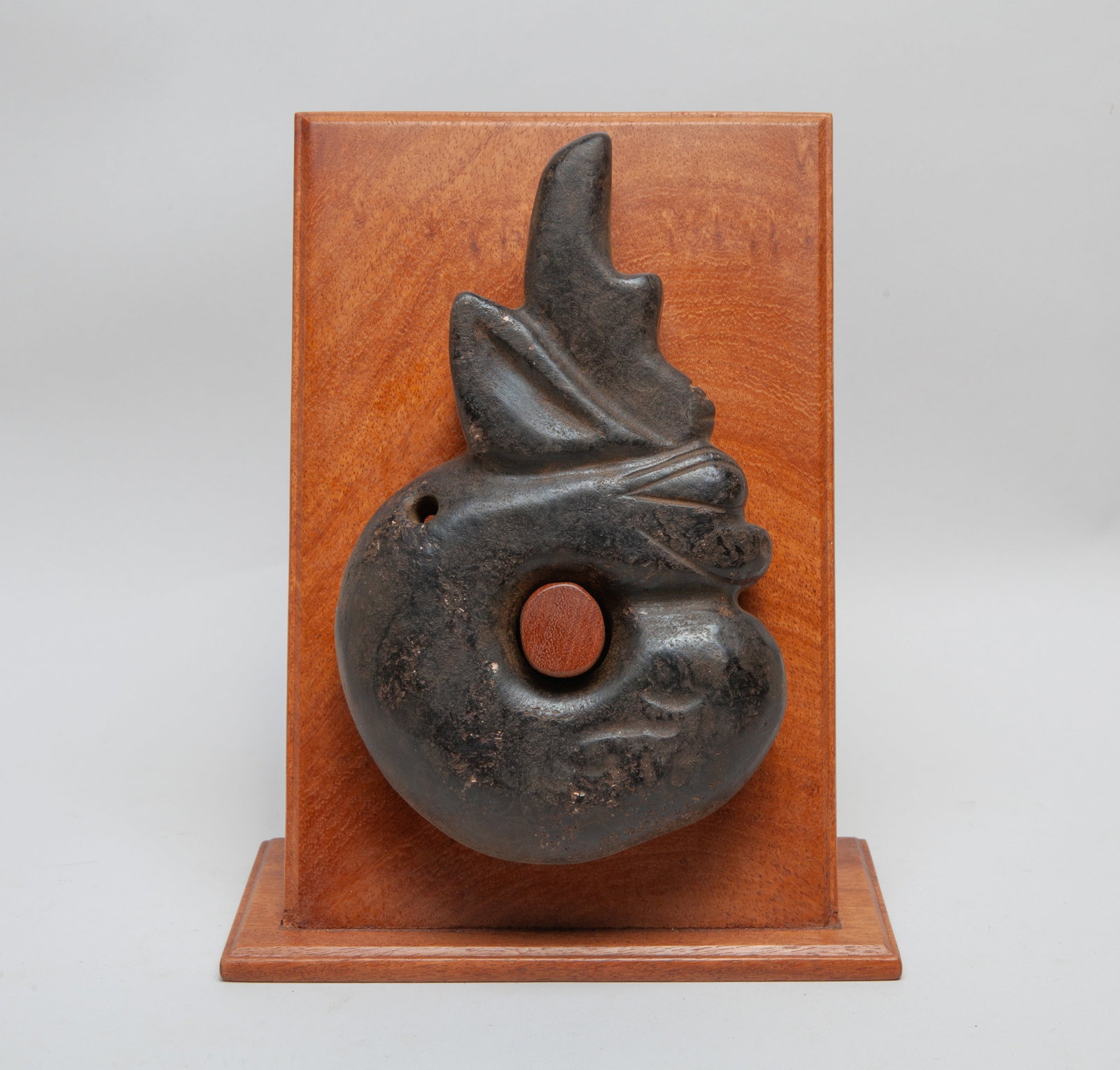 Chinese Export Stone Sculpture on Wood Base: Large heavy Chinese stone sculpture of archaic pig-dragon form, with wood stand. Approx. 8.5*5.3*1.9 inch (w/o stand).