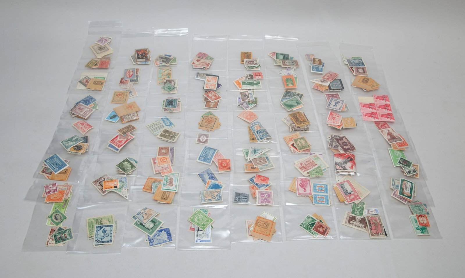 Large Set Fine World Stamps Collections: Large group of world stamps. Size varies.