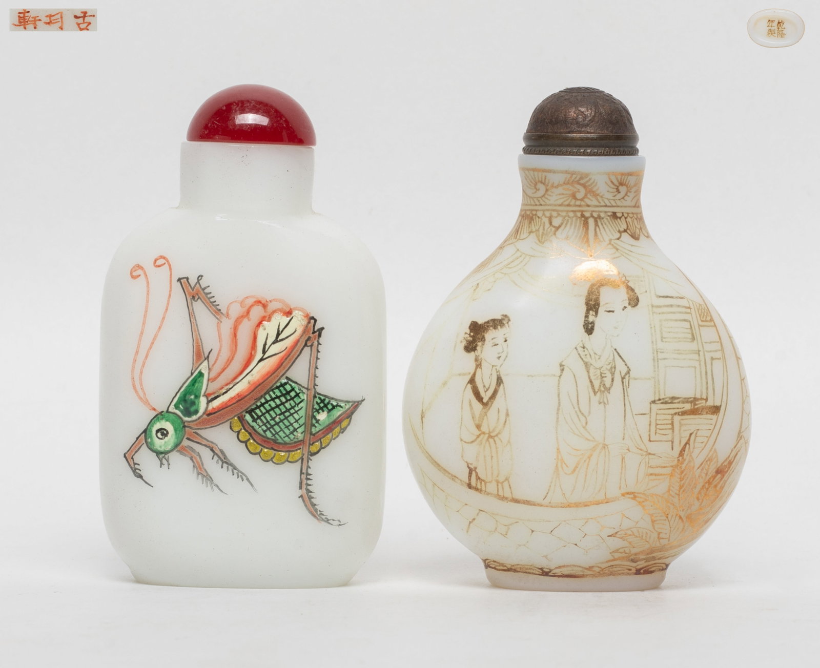 Two Chinese Peiking Glass Snuff Bottles: One enameled with grasshopper, marked three characters to underside, the other painted figural scene, marked four characters to underside, with stoppers. Approx. 2.7*1.88*1.15 inch (larger w/ stopper)
