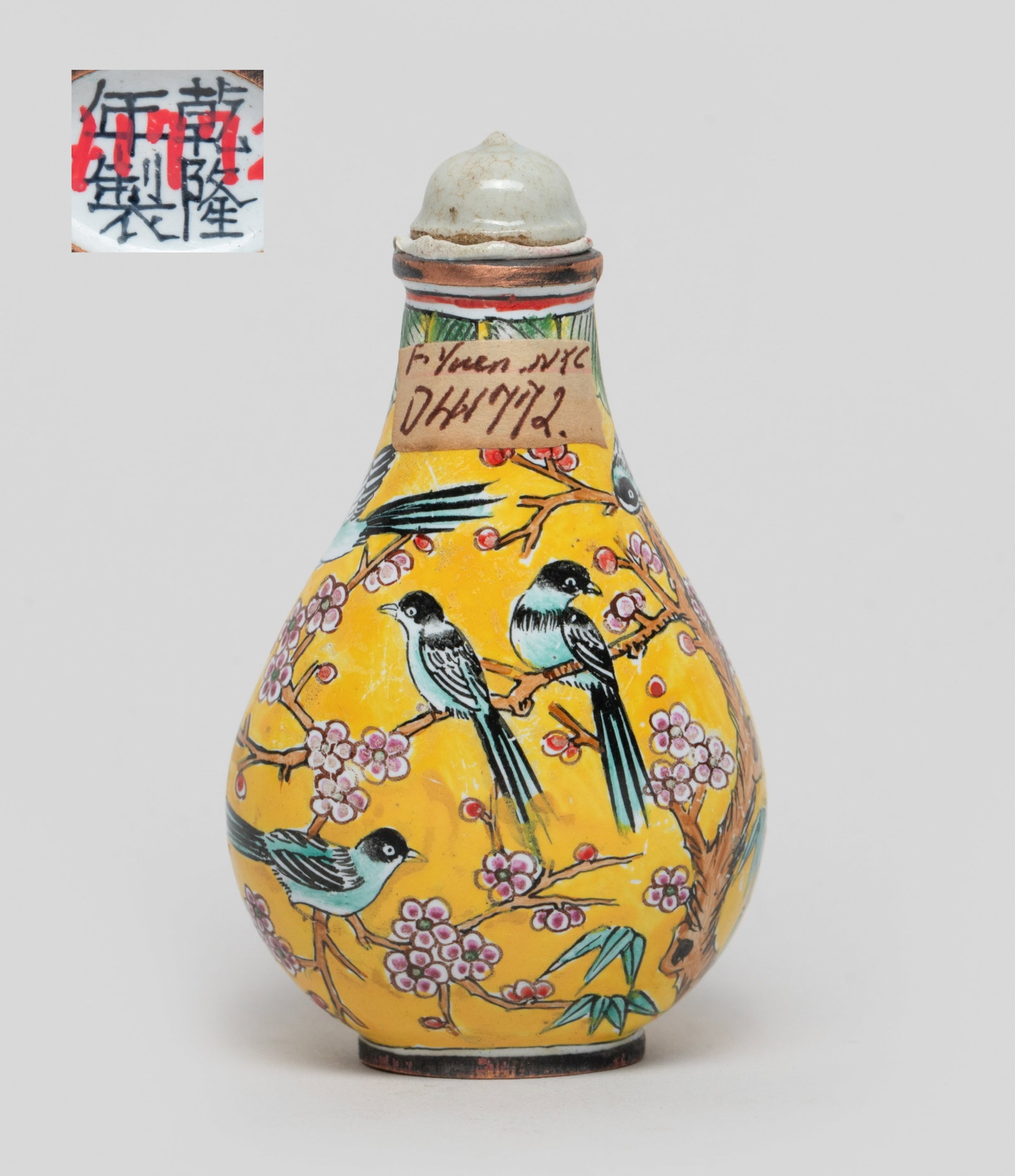 Estate Chinese Enameled on Copper Snuff Bottle: Of pear shape, enameled and painted with magpies and plum blossoms on bright yellow background, the bottom marked with four characters, with a stopper. Approx. 2.8*1.6*1.1 inch. The Estate of the Stor