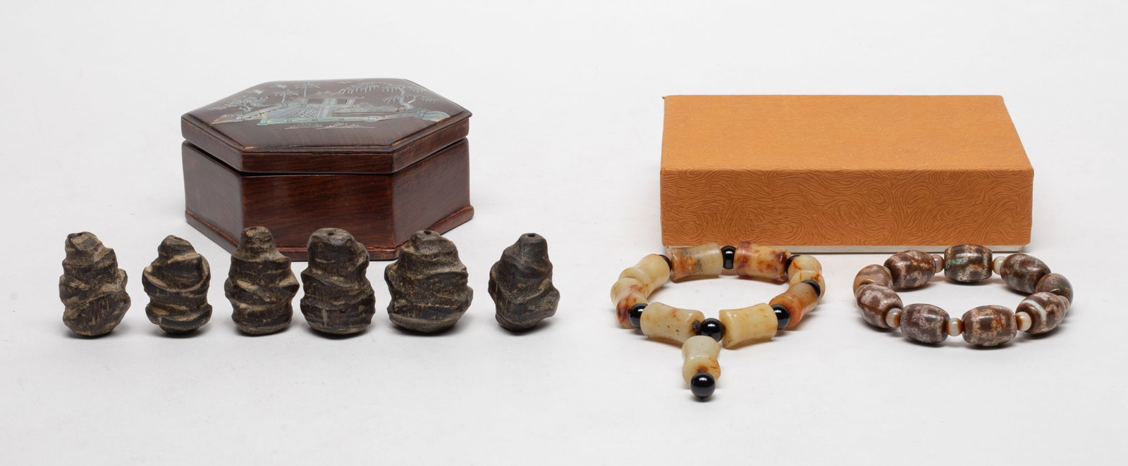 Chinese Export Agarwood Beads, Jade/ Stone: Including two jade / stone bead bracelets, and six agarwood carved nugget beads, with boxes. Approx. 49 gram (total agarwood weight). 1.3*1.1*0.9 inch (largest nugget).