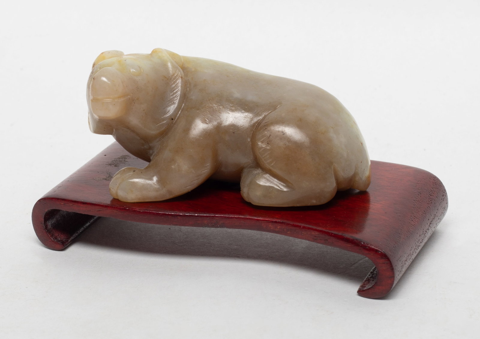 Estate Chinese Russet Jade Sculpture w/ Base: Chinese russet jade carved beast sculpture, with base. Approx. 2.62*1.45*1.2 inch (w/o base).
