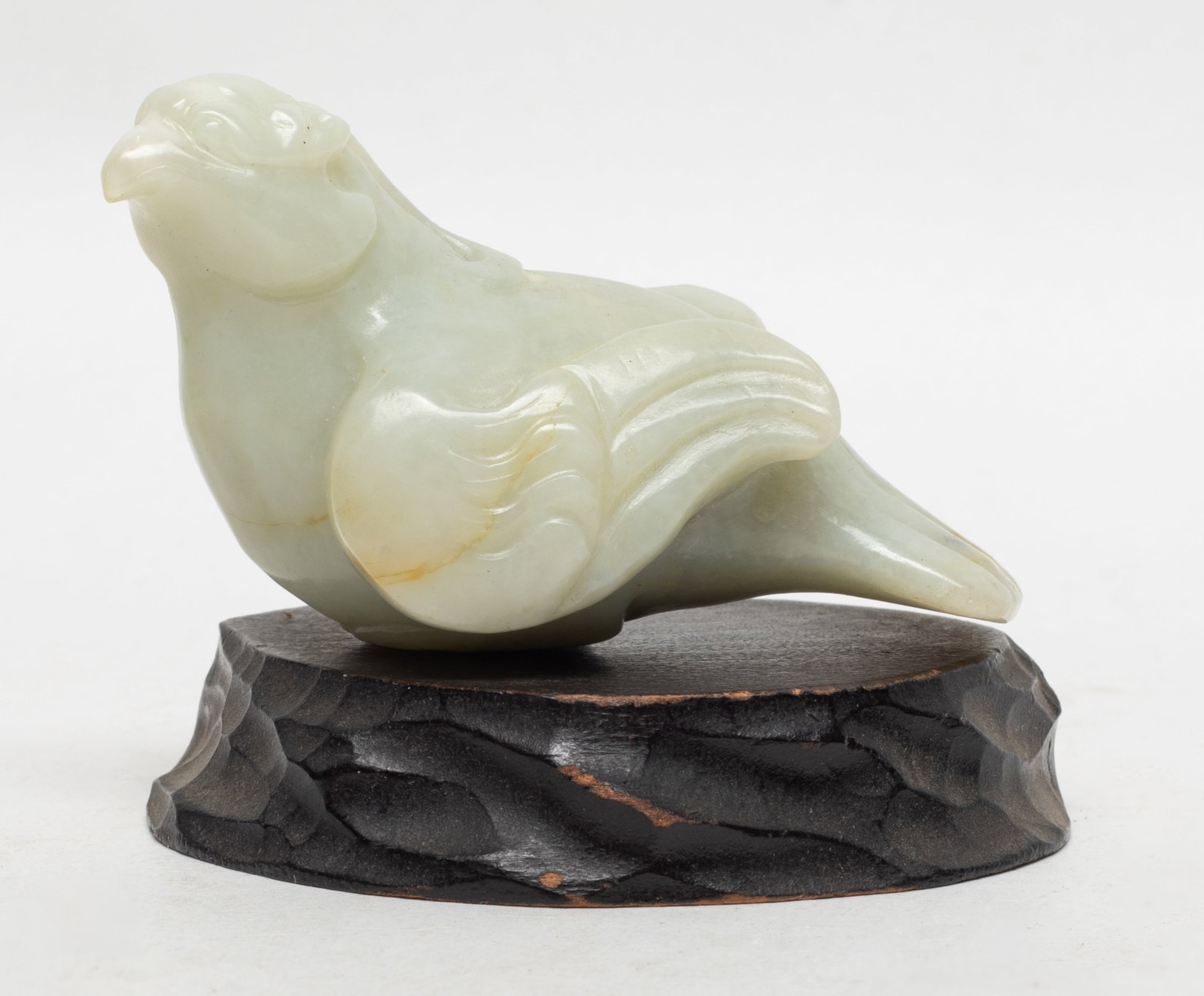 Chinese Russet Jade Sculpture on Base: Chinese russet jade carved bird sculpture, with base. Approx. 3.3*1.8*1.7 inch (w/o base).