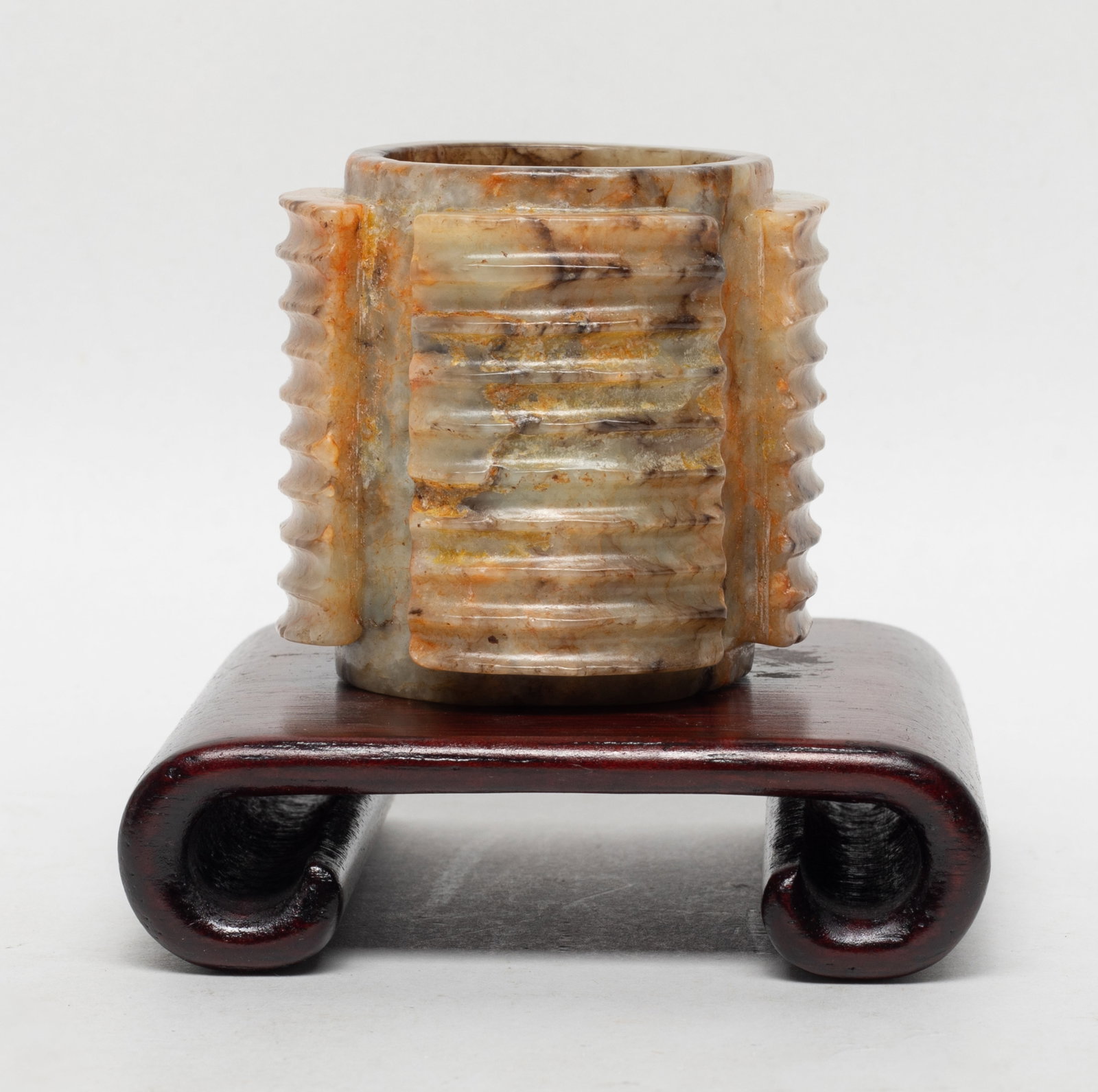 Estate Chinese Russet Jade Carved Cong: Chinese russet jade carved special form cong, with wood base. Approx. 2.27*2.15 inch (jade size).