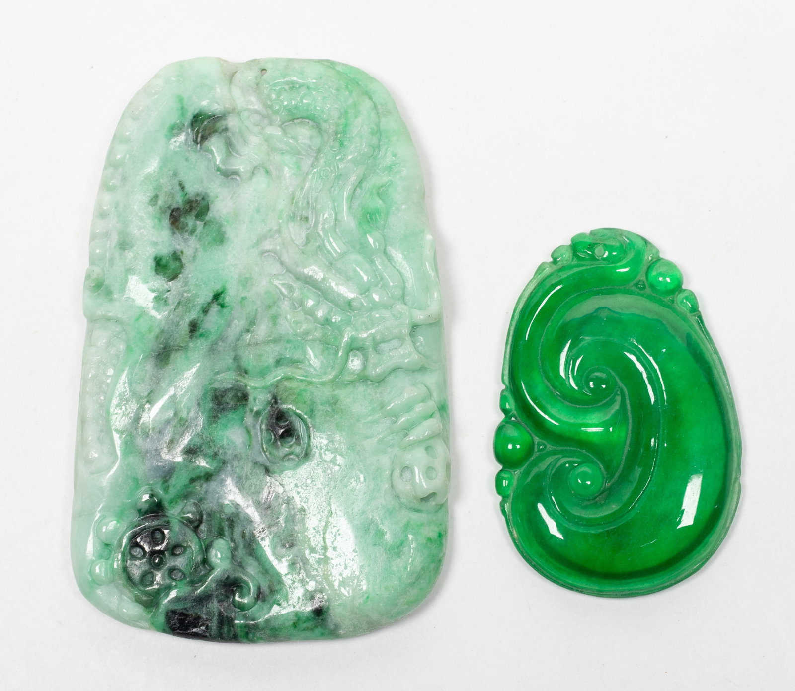 Two Chinese Jade Like Pendants: Two Chinese jade-like pendants carved dragon or lingzhi. Approx. 3.3*2.1 inch (larger).
