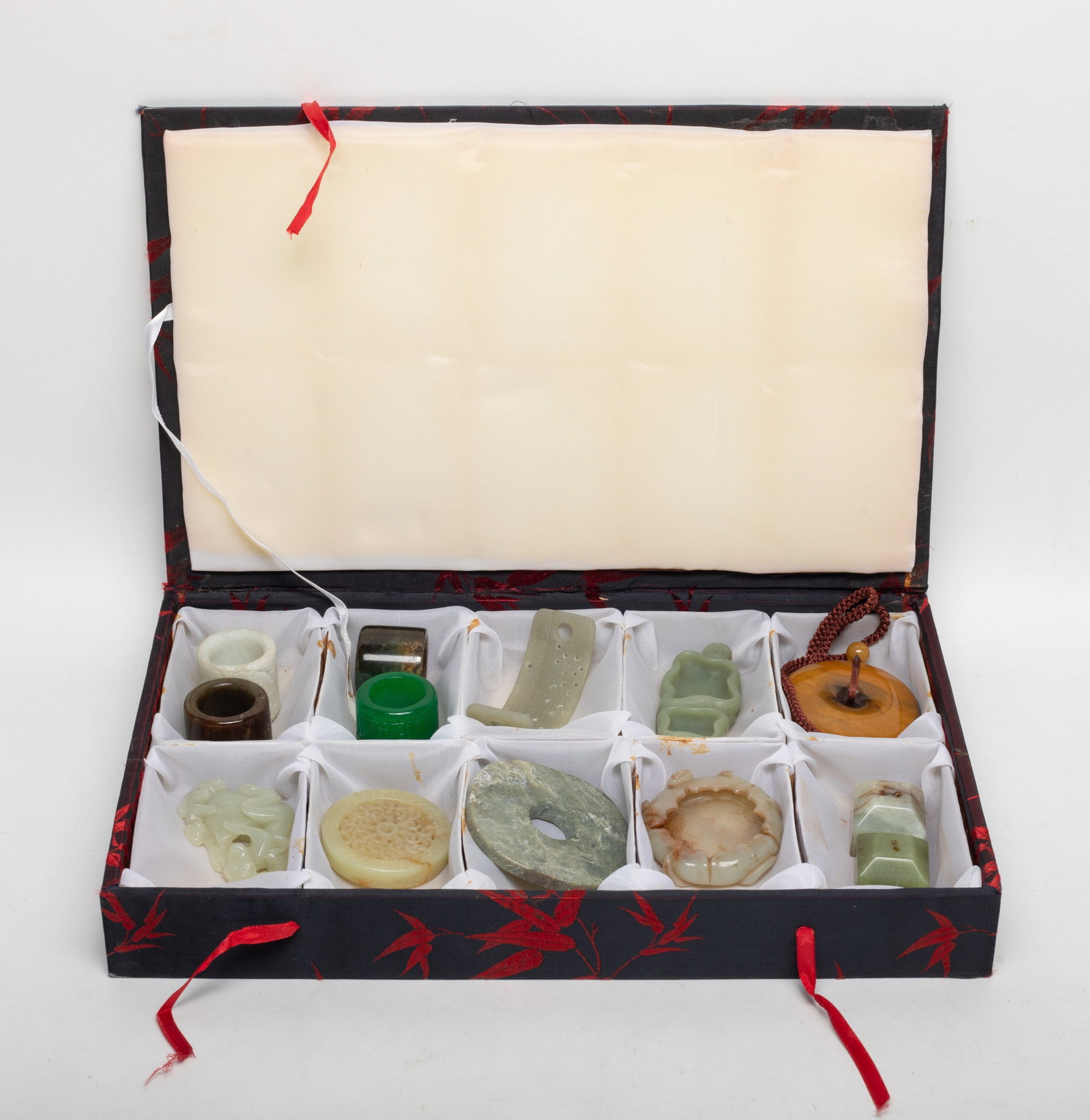 Set Chinese Export Jade/ Stone Carvings: Including 4 thumb rings, 2 seals, and 7 jade / stone carvings, with box. Size varies.