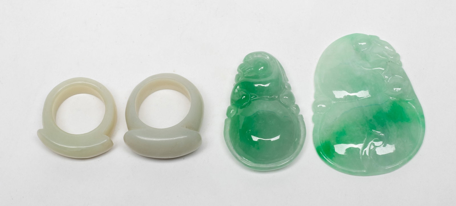 Chinese Export Jade Rings, Pendants: Including two thumb rings and two pendants carved gourd and beast. Approx. 2.2*1.6 inch (larger).