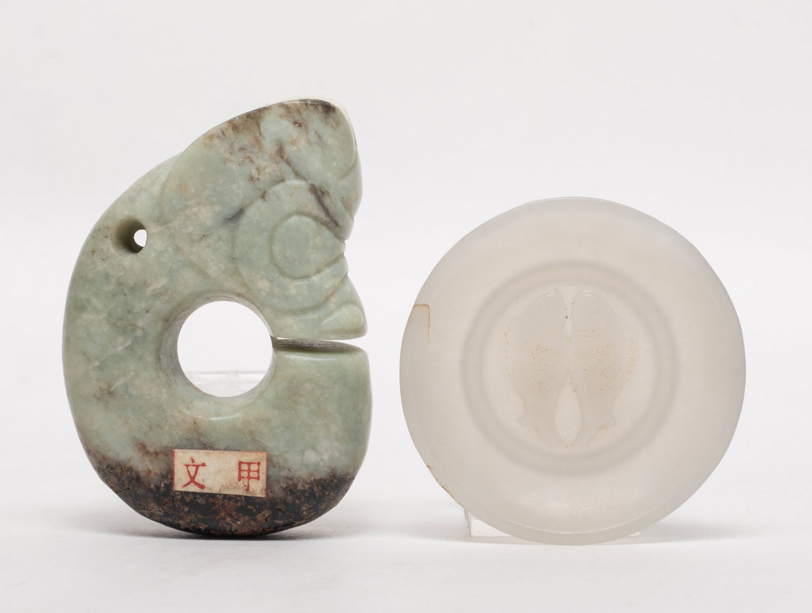 Chinese Russet Jade Pendant, Snuff Dish: Chinese russet jade pendant of archaic pig-dragon form, and white jade snuff dish carved a pair of fish. Approx. 2.5*1.77*0.68 inch.