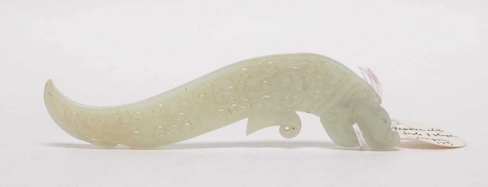 Vtg. Chinese Export White Jade Pendant: Chinese white jade pendant carved of stylized dragon form. Approx. 4*1.1 inch.