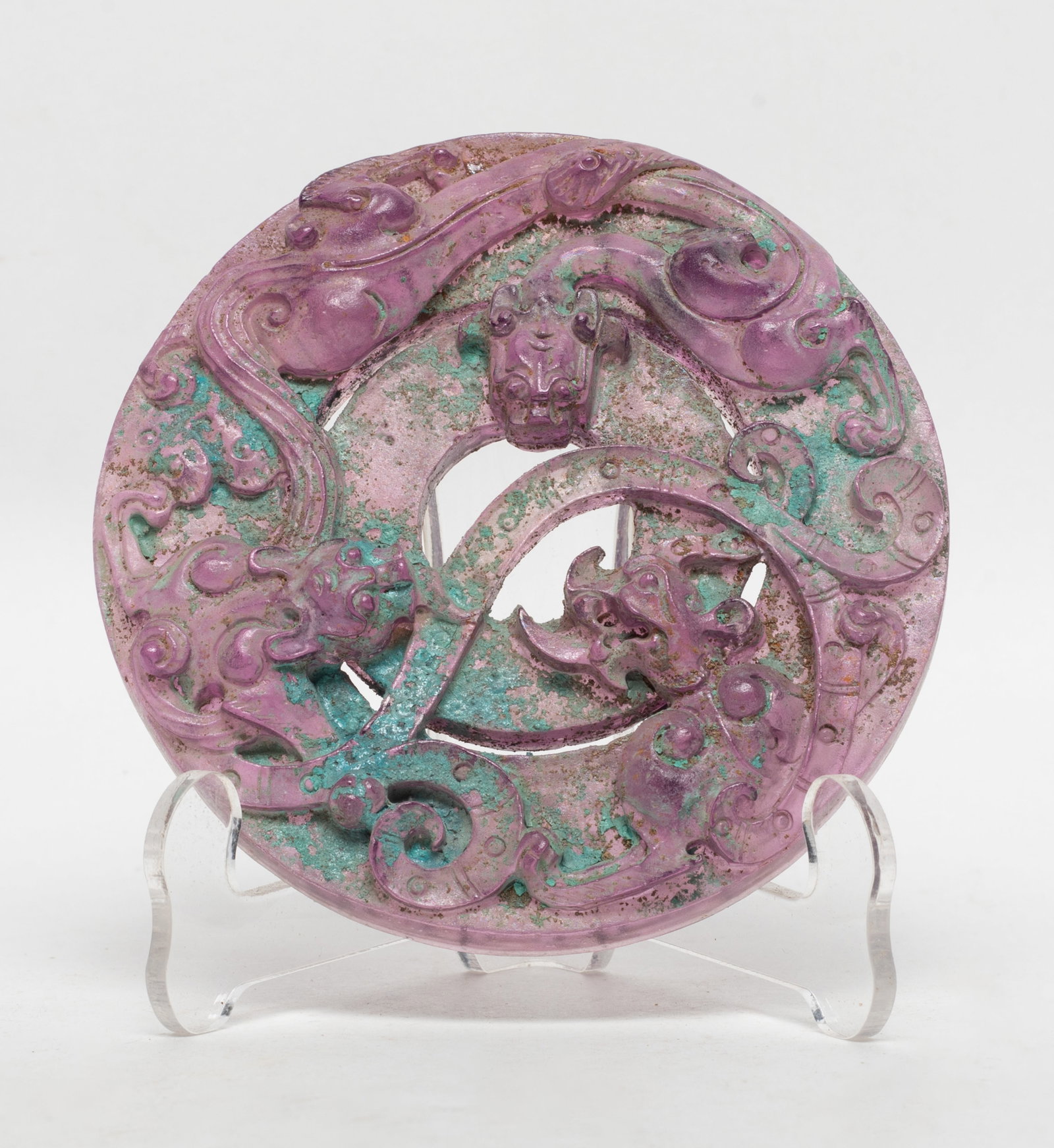 Unusual Chinese Glass Carved Bi: Chinese glass bi carved in high relief with chi dragons. Approx. 3.5 inch D.