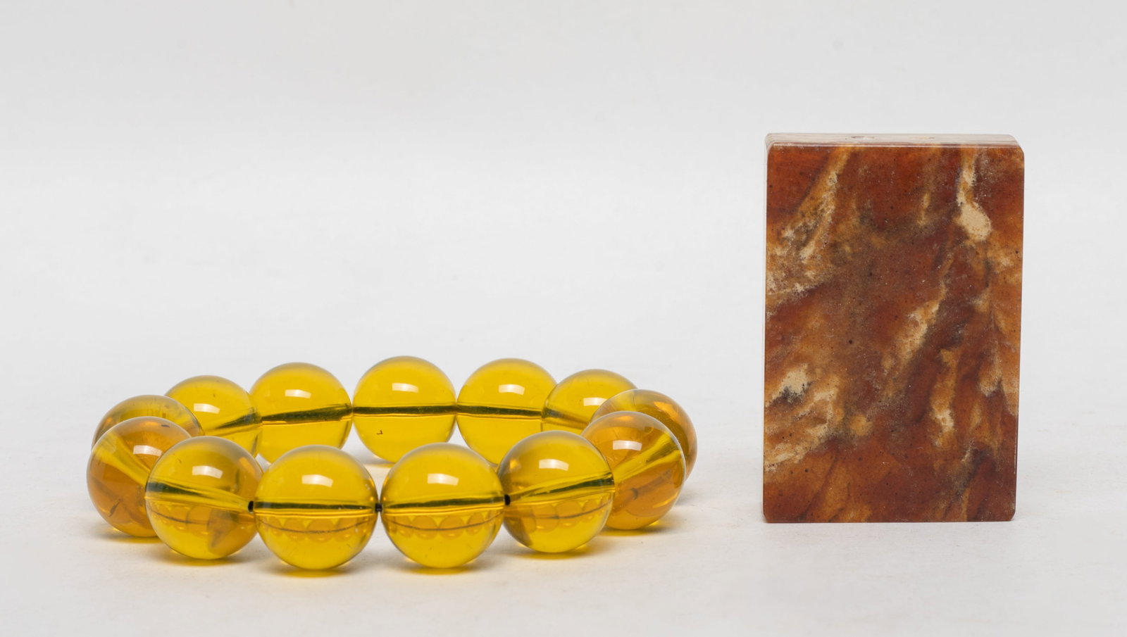 Estate Chinese Amber Pendant, Bracelet: Chinese amber pendant and bead bracelet. Approx. 2.27*1.5*0.63 inch (pendant size).