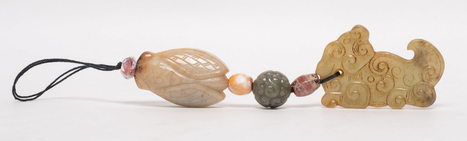 Estate Chinese Russet Jade, Agate Pendant: Including a russet jade cicada pendant, a russet jade beast pendant, a jade bead, and three agate beads. Approx. 2.4*1.57 inch (largest).