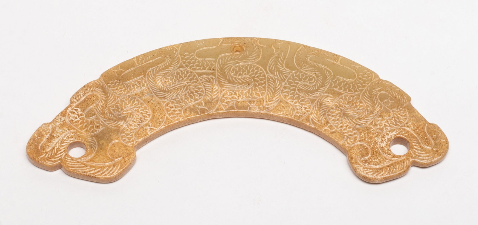 Chinese Jade/ Stone Carved Huang: Chinese jade / stone huang carved with intertwined dragons on both sides. Approx. 5.37*1.27 inch.