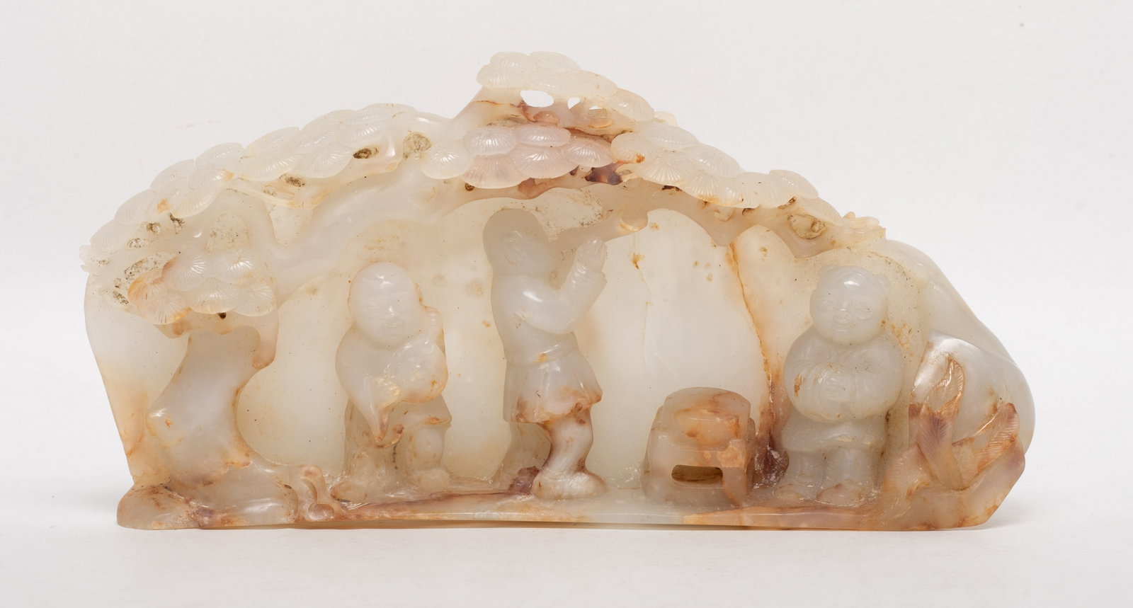 Estate Chinese Russet Jade Table Sculpture: Chinese russet jade sculpture carved with three boys under pine tree. Approx. 7.2*3.6*1.2 inch.