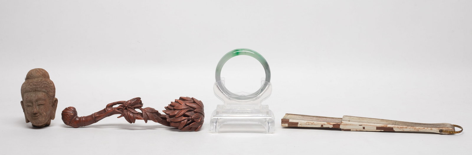 Chinese Bangle, Pottery, Wood Sculpture, Fan: Including a bangle with stand, a pottery Buddha head, a wood sculpture and a fan. Approx. 7.7*2.2*1.4 inch (wood size).