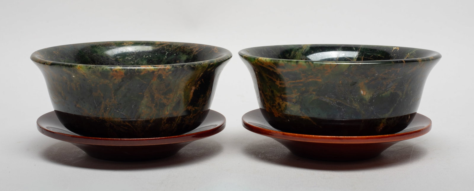 Two Chinese Spinach Jade Large Bowls: Two Chinese spinach jade bowls, the surface finely smoothed and polished, with saucers. Approx. 4.4*2 inch (each bowl size).