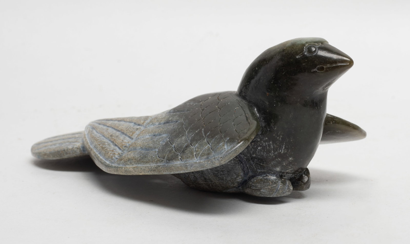 Large Chinese Russet Jade Carved Bird: Large Chinese finely carved russet jade bird sculpture. Approx. 5.2*2.97*1.93 inch.