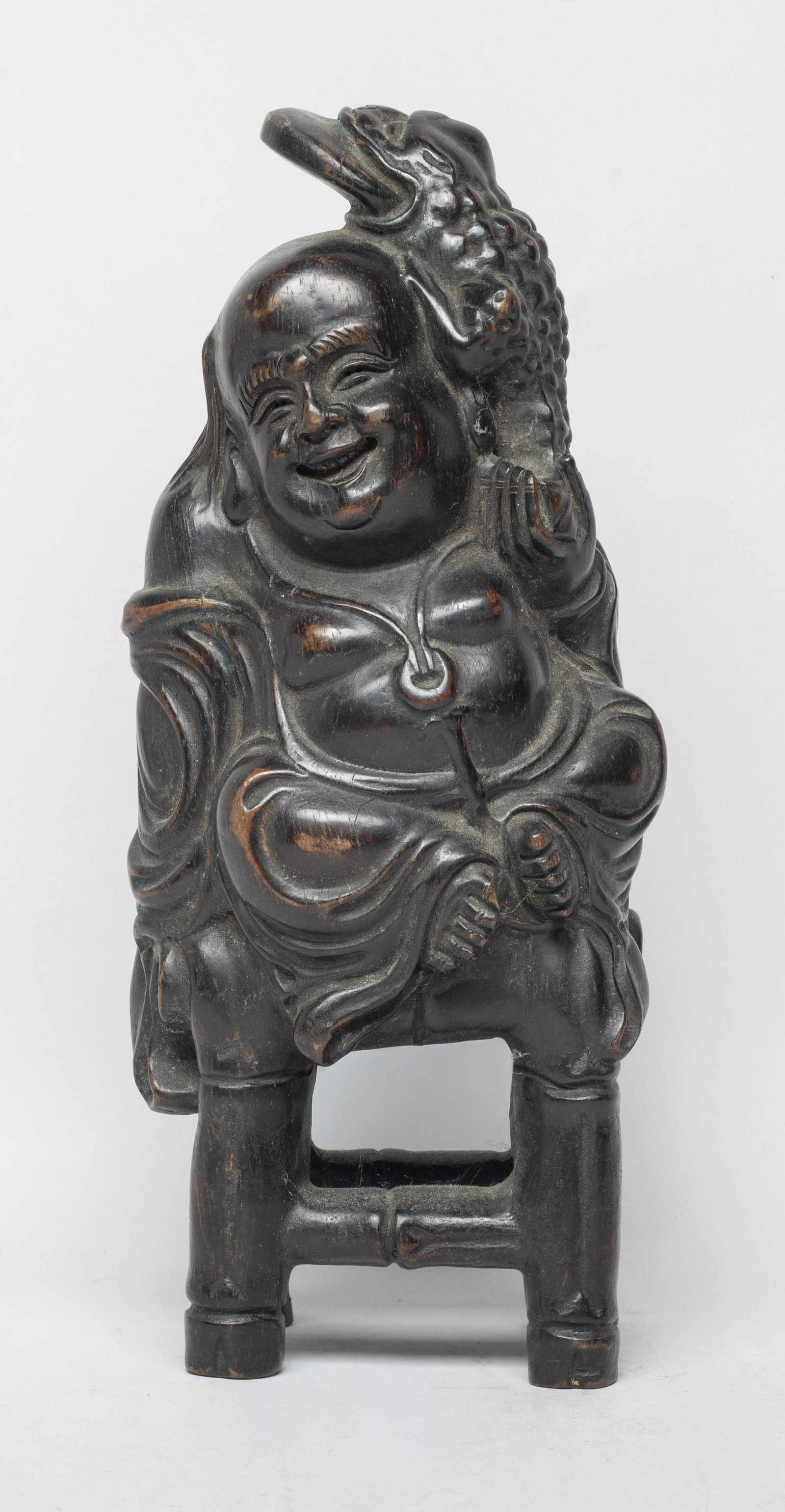 Heavy Chinese Wood Carved Sculpture of Liuhai: Vividly carved as laughing Liuhan seated on a bench, his left hand holding a toad grasping a coin in mouth. Approx. 9.2*3.9*3.1 inch.