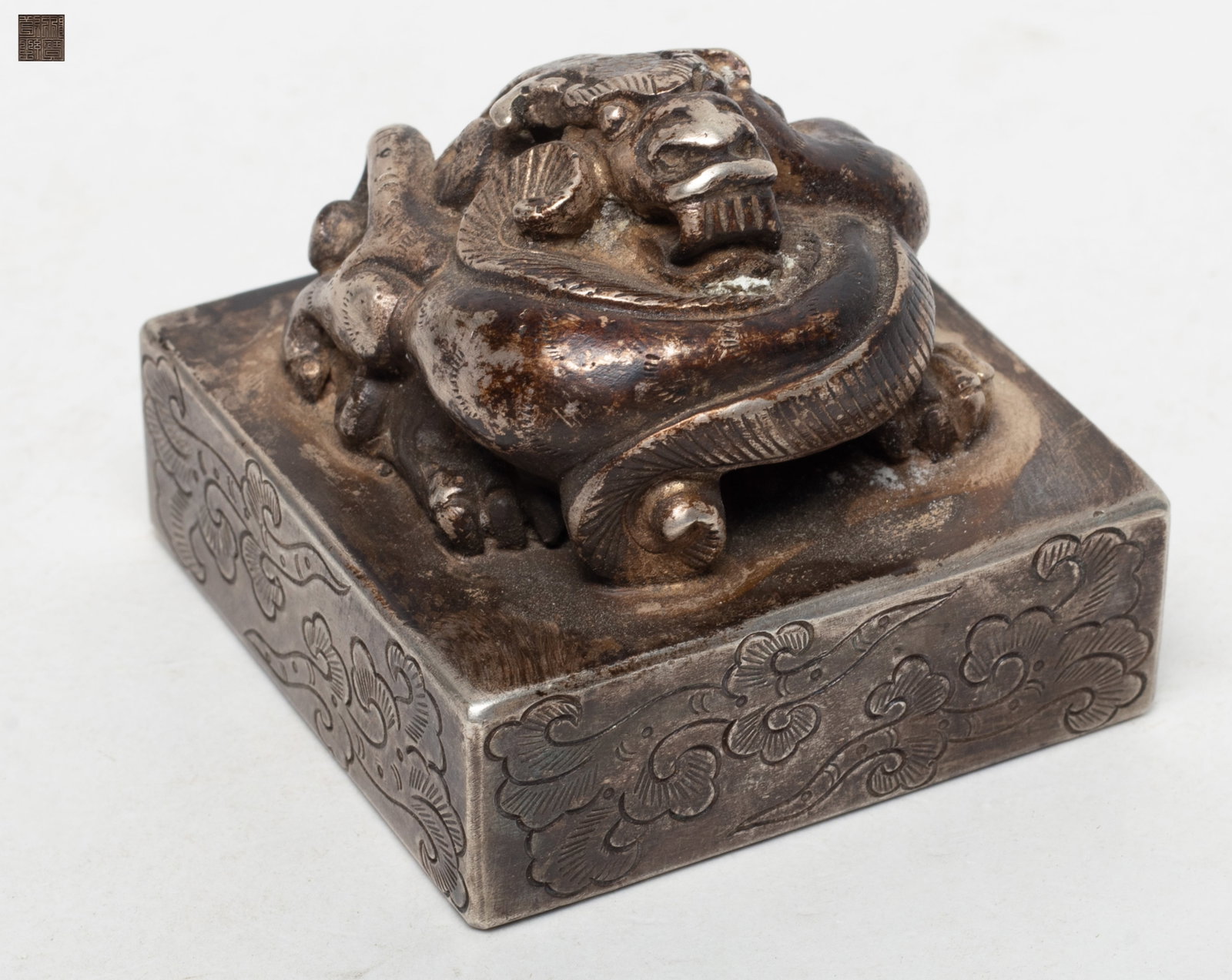 Estate Chinese Heavy Beast Seal: Heavy Chinese metal seal cast with a coiled archaistic beast on the top. Approx. 2.25*2.25*1.9 inch.