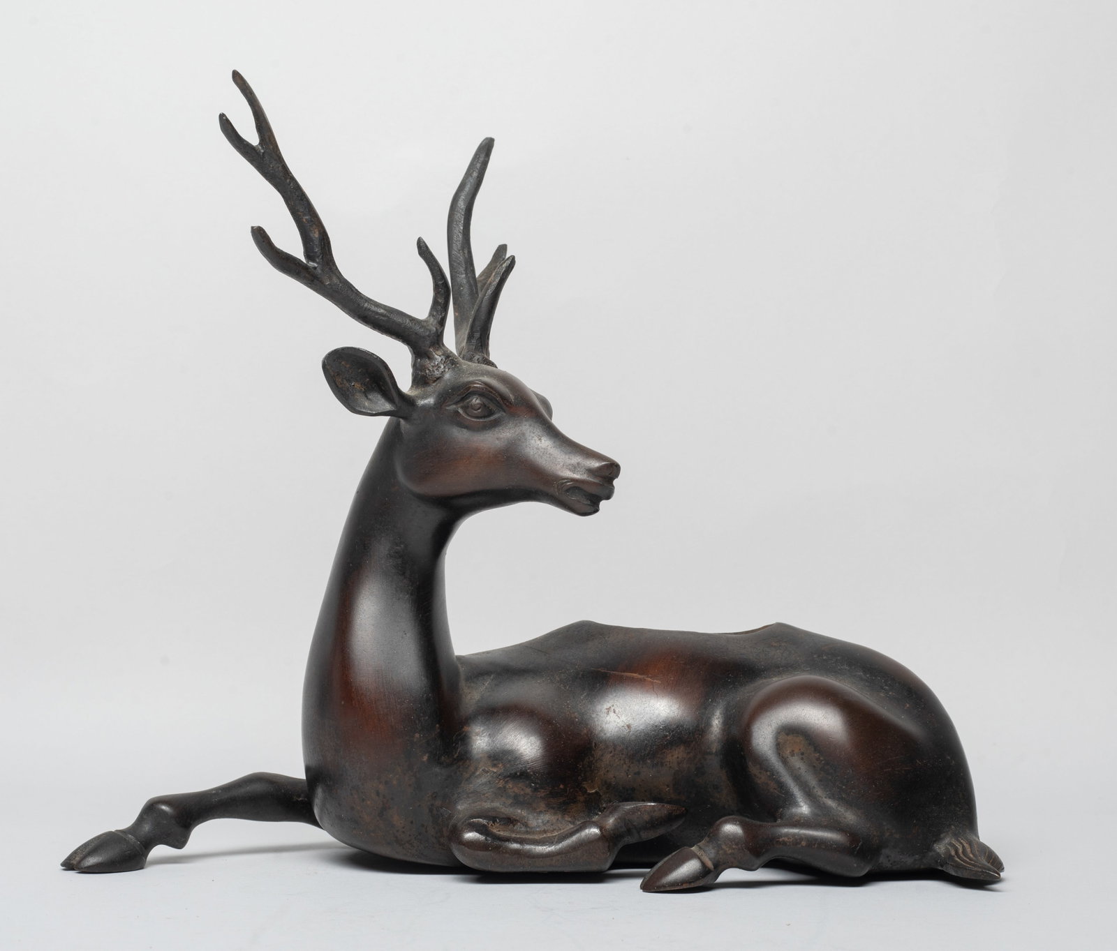 Vintage Japanese Bronze Censer of Deer: Vintage Japanese bronze censer molded of recumbent deer form, the deer head turned backwards. Approx. 7.7*9.5*4.2 inch.