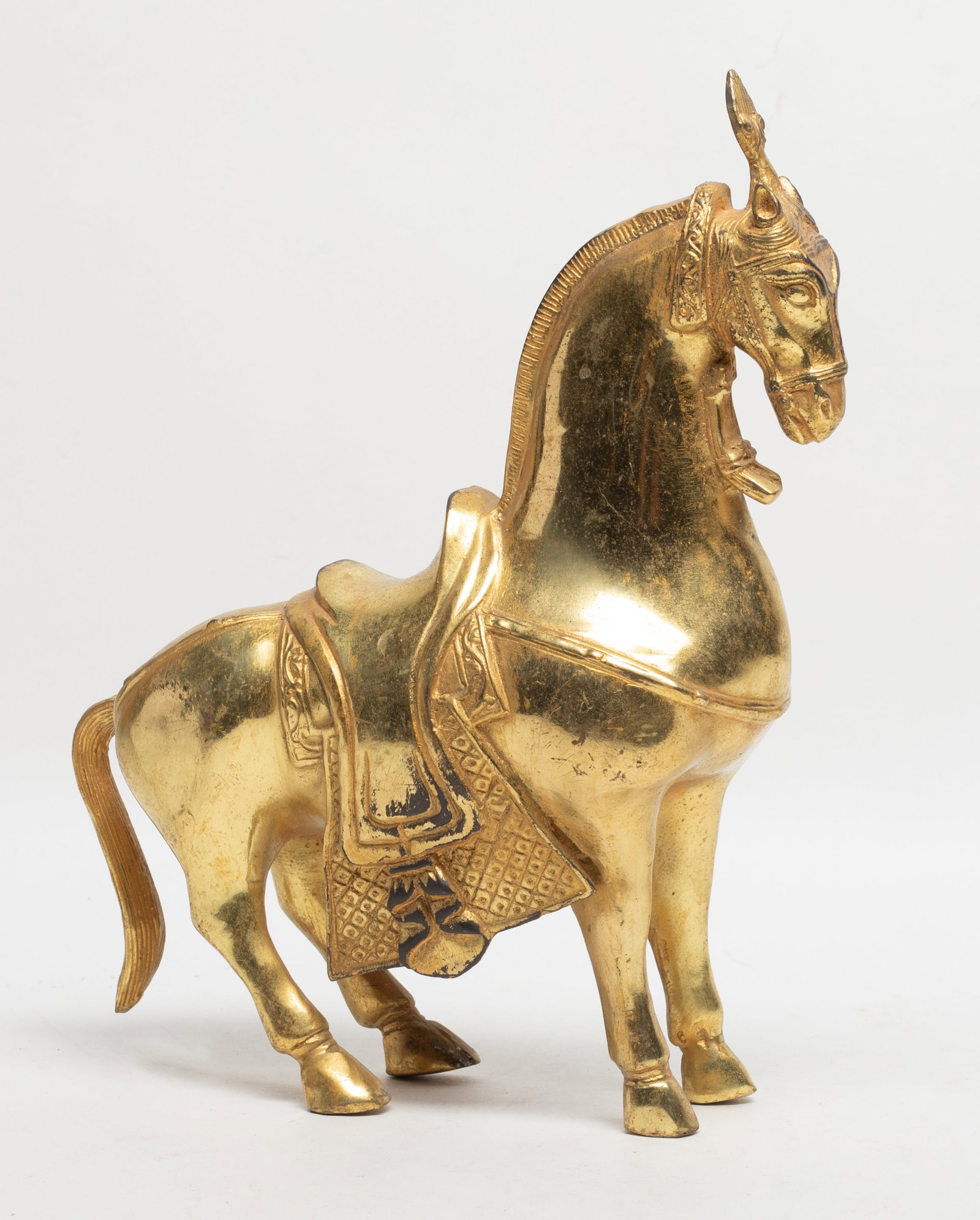 Chinese Gilt Bronze Sculpture of Horse: Chinese gilt bronze table sculpture of standing horse form. Approx. 9.3*7.6*2.8 inch.