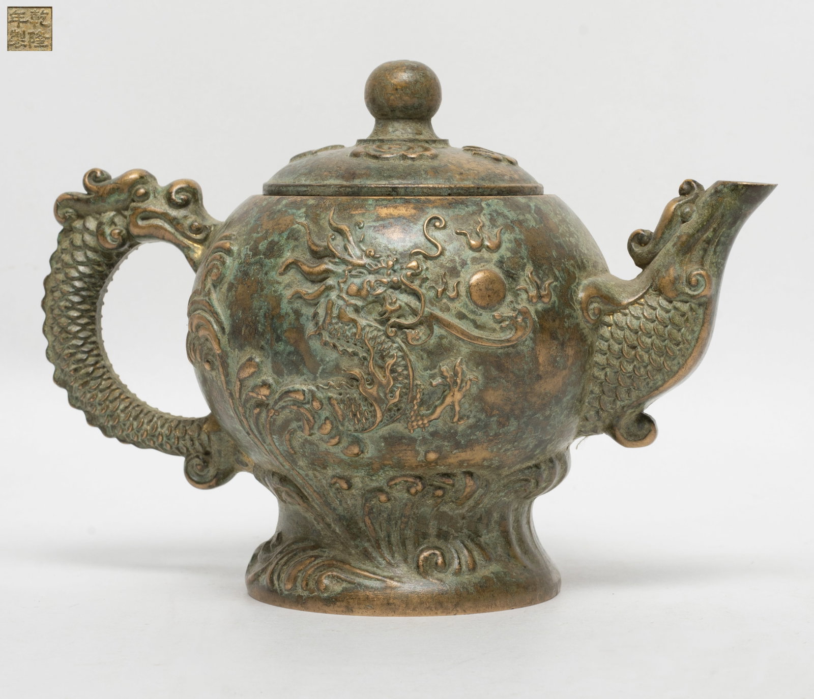 Heavy Chinese Export Bronze Pot: Chinese bronze pot cast with dragons jumping out of waves, with four-character mark to underside. Approx. 7.2*5*4.2 inch.