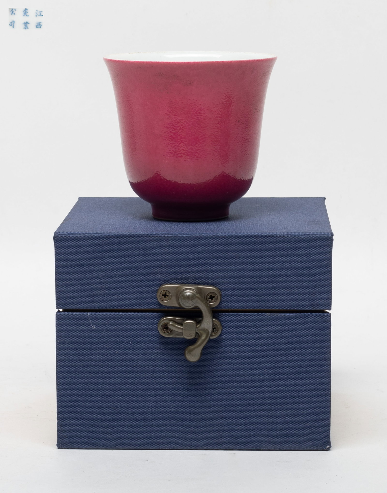 Chinese Export Porcelain Tea Cup: Chinese rouge pink glazed porcelain tea cup, marked six characters to bottom, with box. Approx. 3.1*2.9 inch (cup size).
