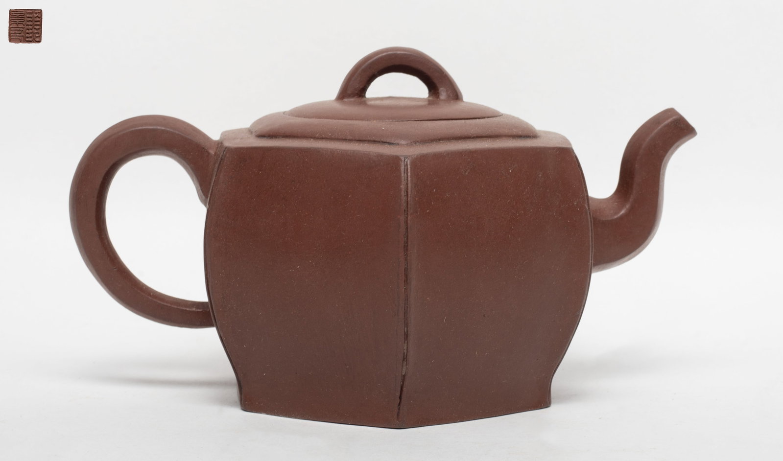 Chinese Export Yixing Zisha Tea Pot: Chinese Yixing Zisha tea pot, the lid inside with two marks and the bottom with a seal mark. Approx. 3.7*4.7*7 inch.