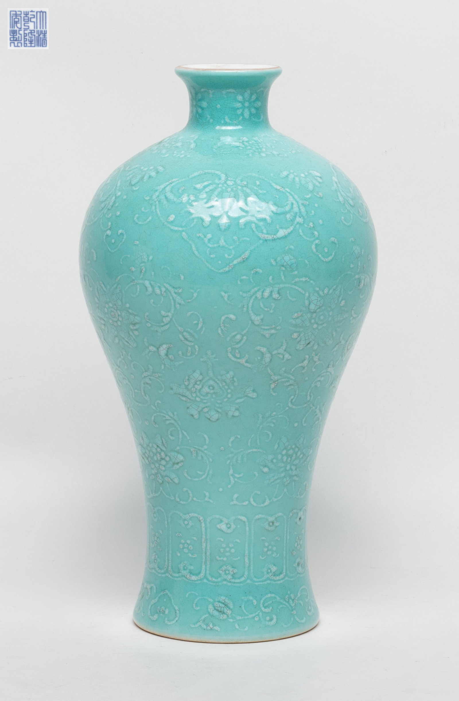 Chinese Enameled Turquoise Glazed Porcelain Vase: Chinese turquoise glazed porcelain vase carved stylized foliage pattern, marked six characters to underside. Approx. 4.6*8.8 inch.