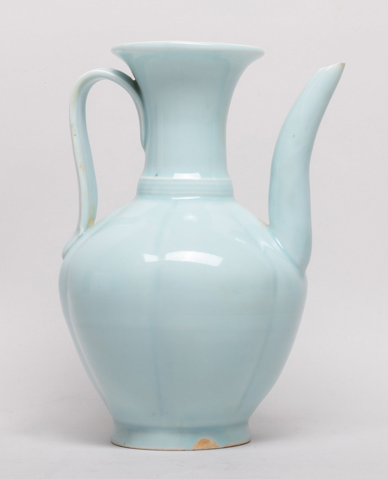Estate Chinese Export Porcelain Pot: The ovoid body of lobed form rising from a short foot to a flared mouth, the exterior and interior neck covered with milky blue glaze. Approx. 7*5*4.2 inch.
