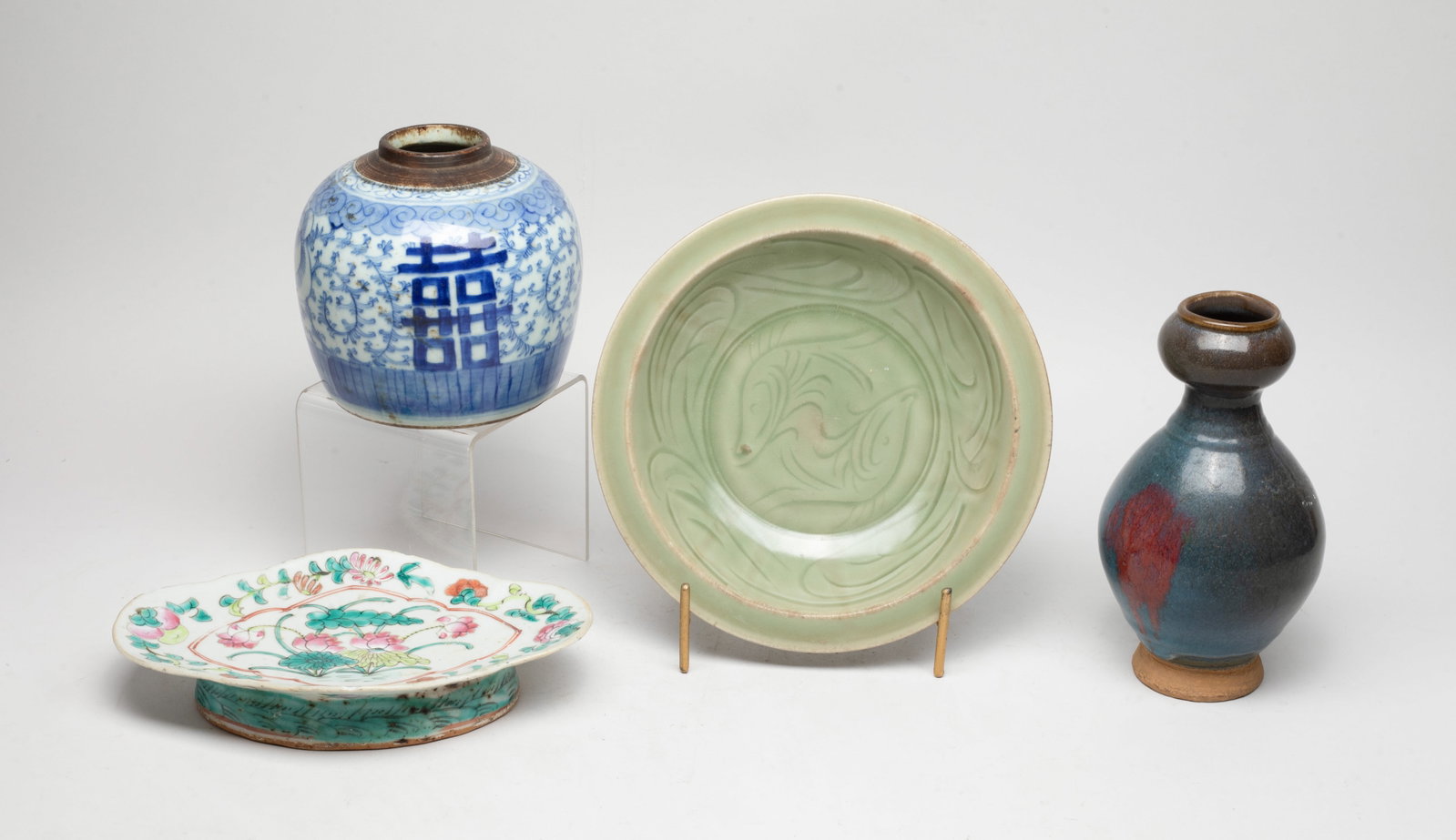 Estate Set Chinese Porcelain Jar, Plates: Including a jar decorated with flowers and double-happiness symbols, a celadon-glazed plate, a plate enameled with flowers, and a vase covered with deep blue glaze with red splash. Approx. 8.2*1.8 inc