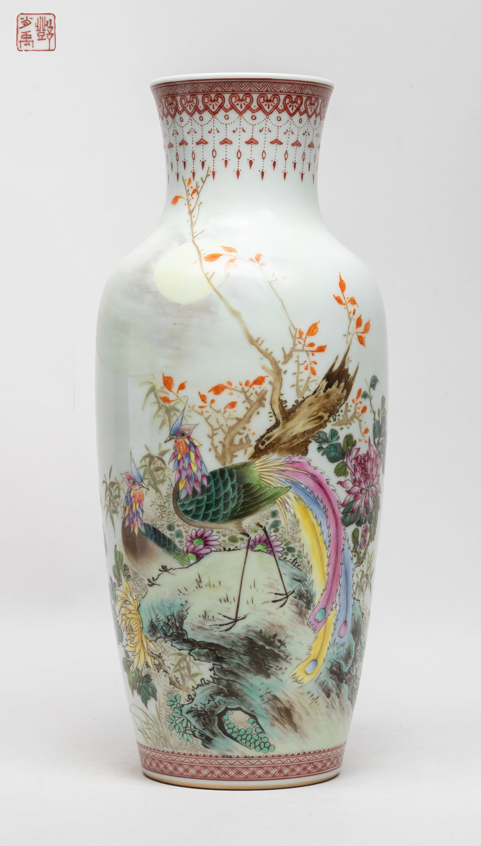Tall Chinese Famille Rose Porcelain Vase: The vase body painted with a pair of phoenixes among blossoming flowers and rocks, inscribed with related passages, the bottom with a seal mark. Approx. 14.9*6.2 inch.