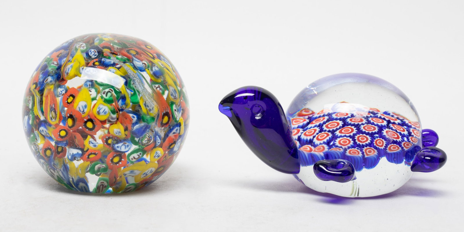 Designed Vintage Millefiori Paperweights: Two vintage Millefiori art glass paper weights. Approx. 2.9*2.6 inch (larger).