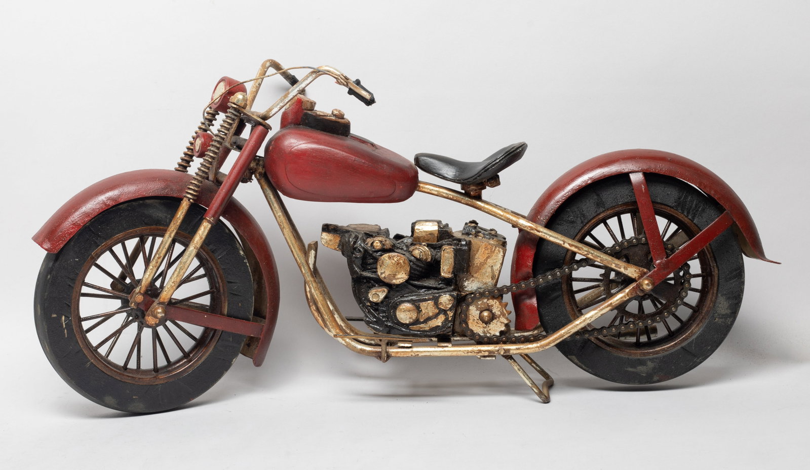 Vintage Painted Metal Harley Davidson Motorcycle: Vintage art painted metal motorcycle sculpture. Approx. 20*9.5*6 inch.