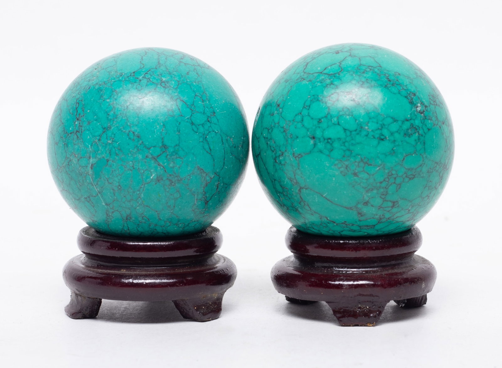 Two Chinese Export Stone Balls: Two Chinese stone carved balls, with stands. Approx. 1.87 inch D (larger).